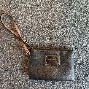 Metallic grey Michael kors wristlet